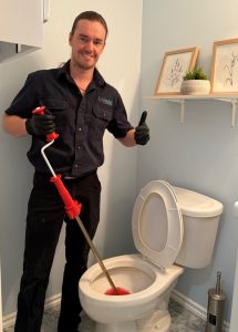 Yaroslav Doing A Drain Cleaning For A Calgarian